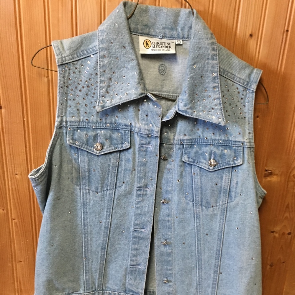 Denim vest with embellishments.  Never worn